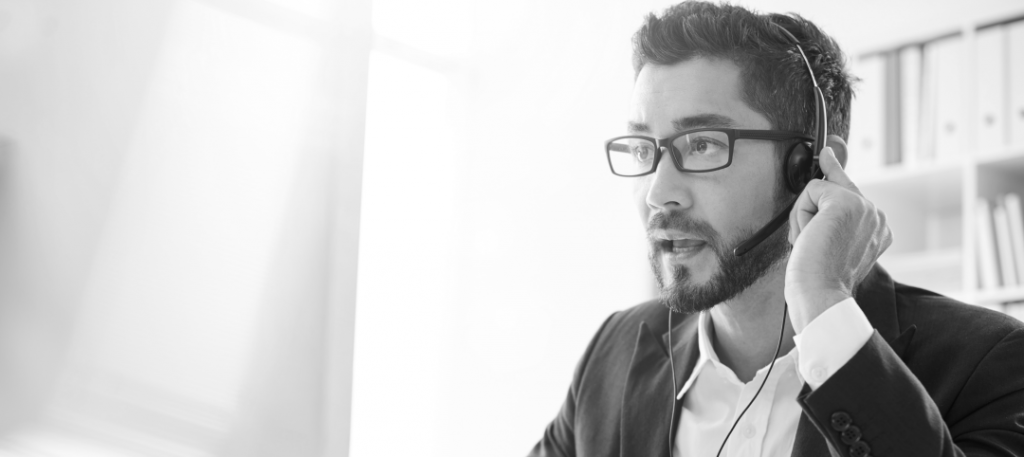 man with glasses and headset